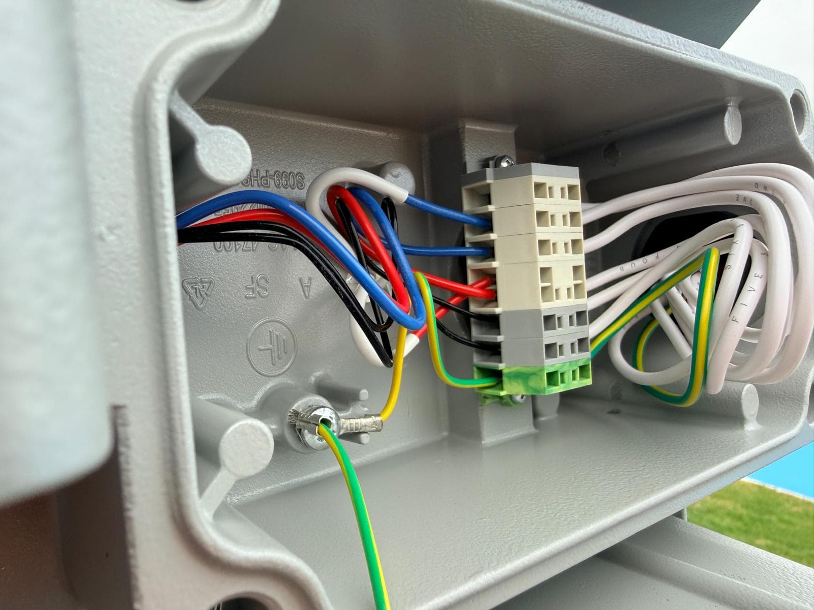 Three phase conductors terminated into terminal blocks with the earth bonded, installed by Thorntek